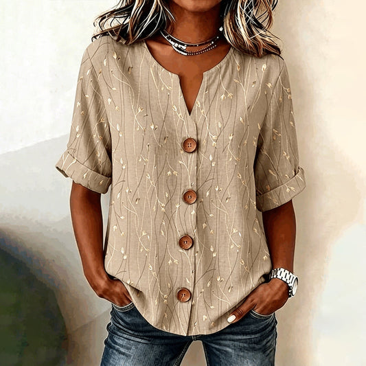 Ginevra – Vintage blouse met bladprint en decoratieve knopen
