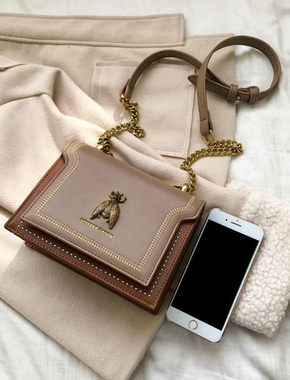 Éloria Paris | Luxe handtas met kettingriem