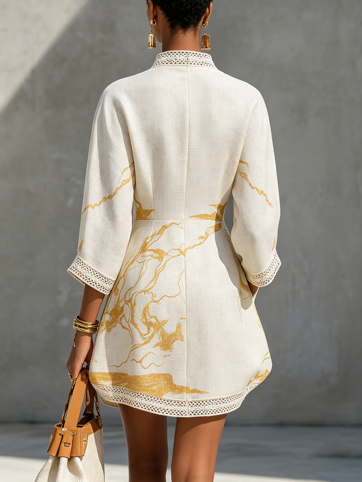 Ivoire | Mini-jurk van viscose met ivoor-gouden print